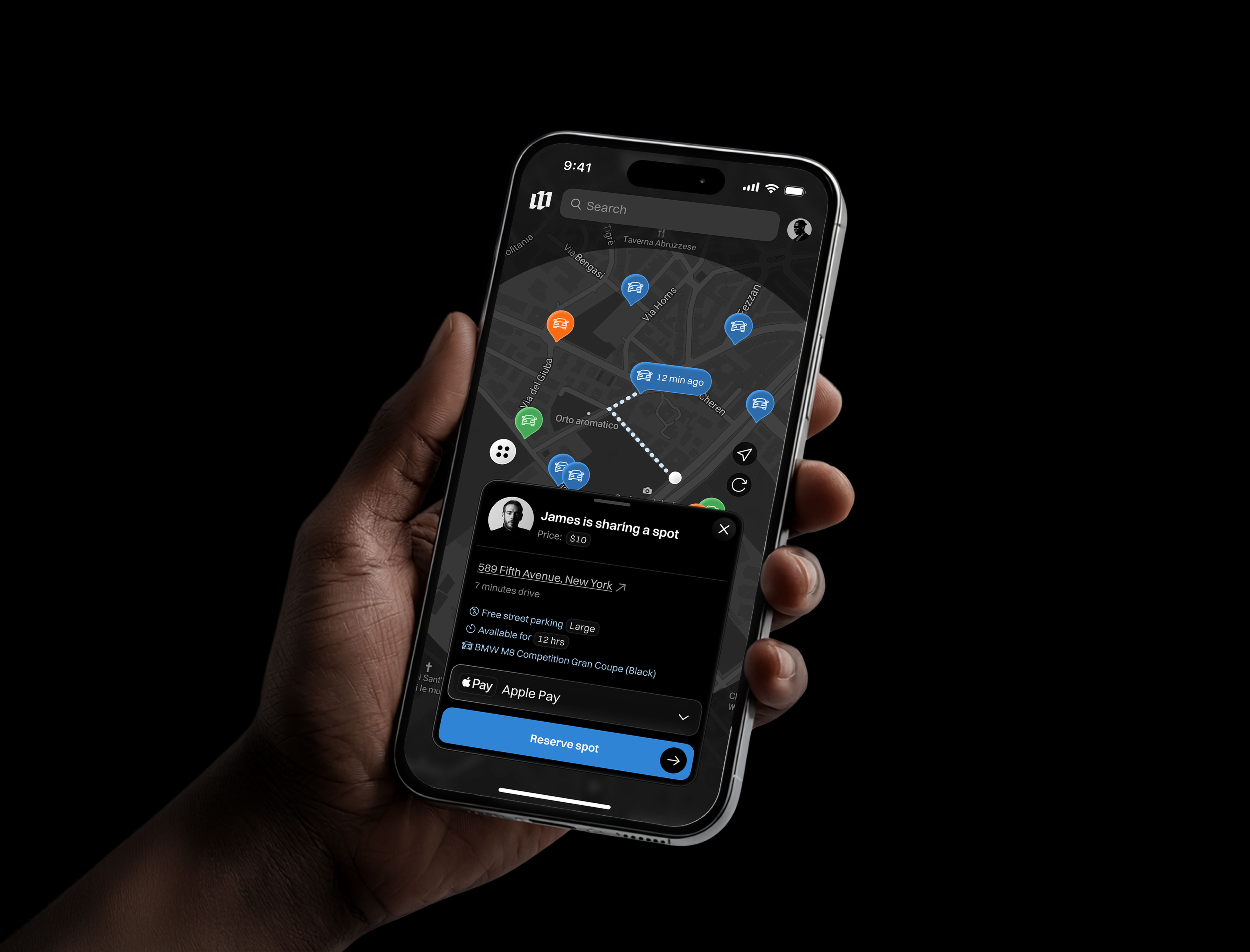 Hand holding a smartphone displaying a dark-themed parking app with a map, showing available spots and a reservation popup for a $10 spot at 589 Fifth Avenue, New York.